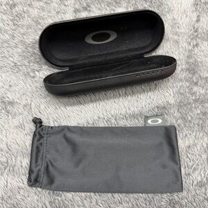 Bundle of Black Oakley Hard and Soft Cases. Total price for the pair.